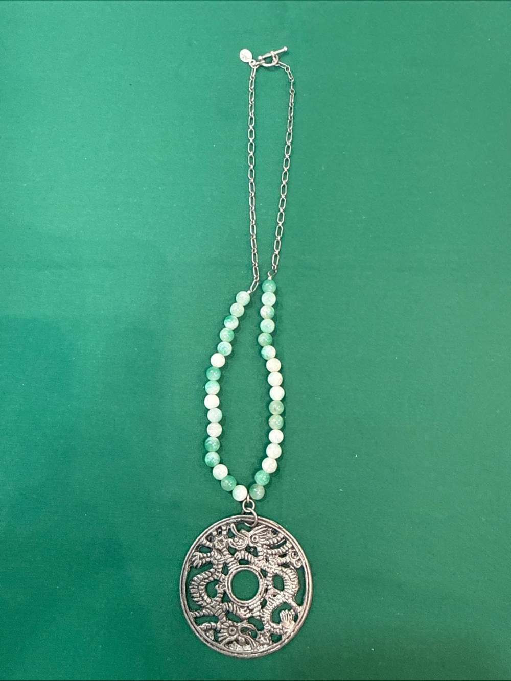 Necklace w/white &green beads large circular pendant w/ dragon design #63A